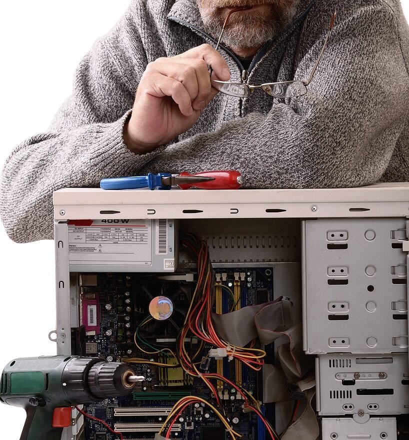 Appliance repair technician at work